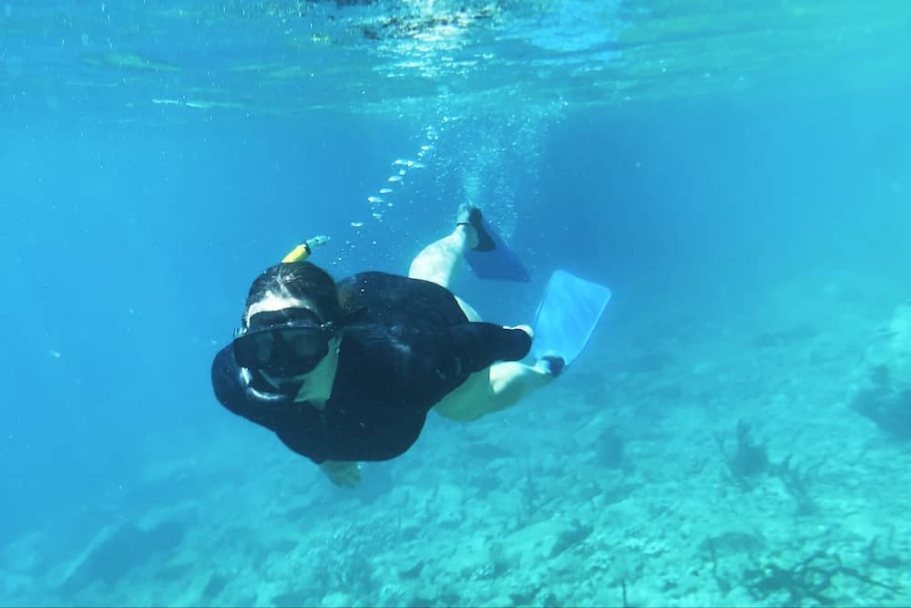 woman snorkeling in Saint Lucia