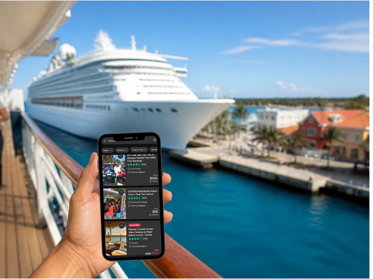 phone screen held in hand while looking at cruise ship